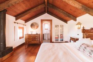 Postel nebo postele na pokoji v ubytování Casa Da Muda