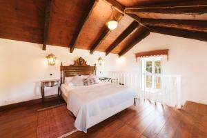 Postel nebo postele na pokoji v ubytování Casa Da Muda