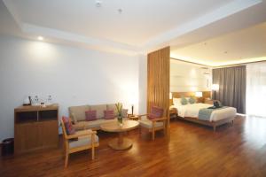 NDC Resort & Spa客房内的一张或多张床位