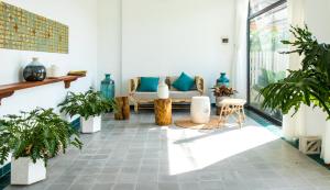 Posezení v ubytování Flora Hotel - Phan Rí Cửa