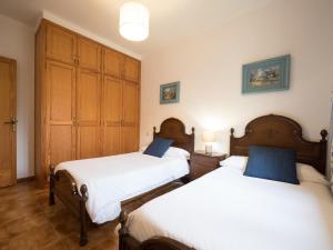 Ein Bett oder Betten in einem Zimmer der Unterkunft Bunyola