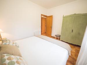 Ein Bett oder Betten in einem Zimmer der Unterkunft Bunyola