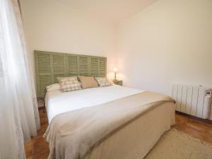 Ein Bett oder Betten in einem Zimmer der Unterkunft Bunyola