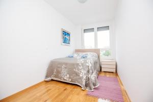Postel nebo postele na pokoji v ubytování Ljubljana finest apartment