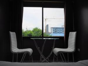 Posezení v ubytování The Feeling Hotel