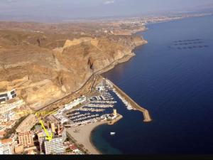 an aerial view of a marina on the side of a mountain at Level 11 Apartment in Aguadulce