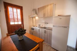 Kuchyň nebo kuchyňský kout v ubytování Sofia Apartments - Kantia