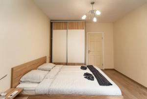 Кровать или кровати в номере Apartment Galia in Burgas city center