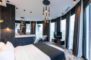 Postel nebo postele na pokoji v ubytování Hotel Adamo