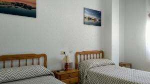 Postel nebo postele na pokoji v ubytování La Obrera