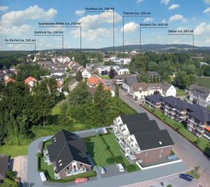 una vista aerea di una città con edifici e strade di Salinendomizil Bad Rothenfelde a Bad Rothenfelde