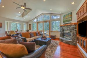 a living room with a couch and a fireplace at Montgomery Estates Retreat in South Lake Tahoe