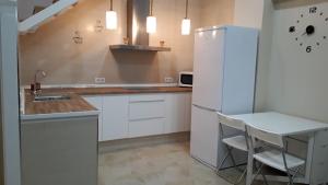 Kuchyňa alebo kuchynka v ubytovaní Duplex Daises