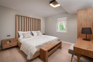 Letto o letti in una camera di Villa Basca