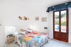 Postel nebo postele na pokoji v ubytování Hotel Giardino