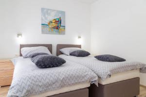Postel nebo postele na pokoji v ubytování Apartments Raspolic