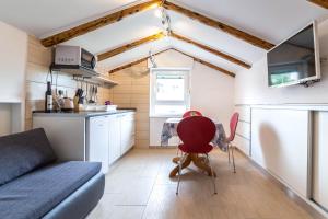 Kuchyň nebo kuchyňský kout v ubytování Apartments Raspolic