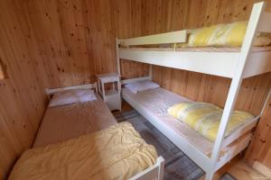 Voodi või voodid majutusasutuse Haugteig toas