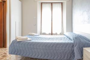 Postel nebo postele na pokoji v ubytování B&B Alba sul Mare Guest House