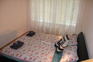 Postel nebo postele na pokoji v ubytování Jurincom apartments Sadová