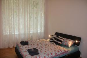 Postel nebo postele na pokoji v ubytování Jurincom apartments Sadová