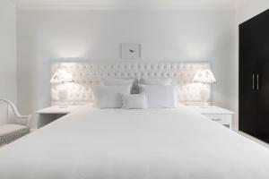 Cama ou camas em um quarto em La Mision Hotel Boutique