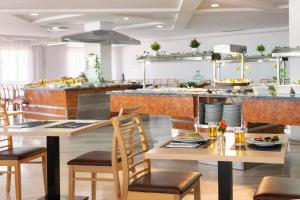 Restauracja lub miejsce do jedzenia w obiekcie Hotel Palia La Roca