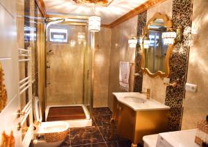 a bathroom with a shower and a sink and a toilet at seasidehouse in Ordu +68 photos