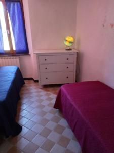 Postel nebo postele na pokoji v ubytování Appartamento in dimora tipica
