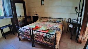 Postel nebo postele na pokoji v ubytování B&B La Nicchiarica + 37 fotografií