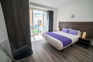 Cama o camas de una habitación en Apartaments Atzavara