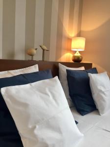 Łóżko lub łóżka w pokoju w obiekcie Apartament Granat