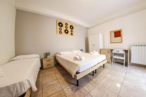 Postel nebo postele na pokoji v ubytování B&B Dimore Sonore Gallipoli + 173 fotografií