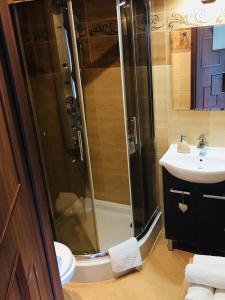 Łazienka w obiekcie Apartament Granat