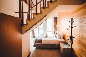 Voodi või voodid majutusasutuse Sasa Nor Lamour B&B toas