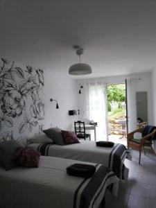 Postel nebo postele na pokoji v ubytování Les Perluètes + 14 fotografií