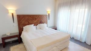 Postel nebo postele na pokoji v ubytování Hotel Boutique MR Palau Verd - Adults Only