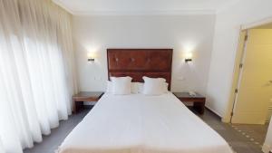 Postel nebo postele na pokoji v ubytování Hotel Boutique MR Palau Verd - Adults Only