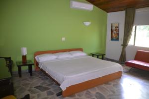 Postel nebo postele na pokoji v ubytování Hotel Albatros