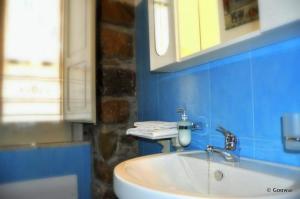 Koupelna v ubytování Thea B&B + 26 fotografií