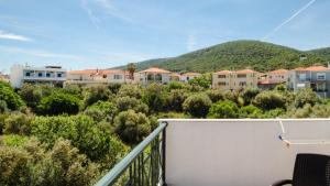 a view from the balcony of a apartment building at Irides Apartments in Megalochori