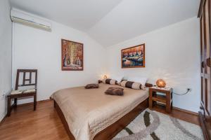 Postel nebo postele na pokoji v ubytování Maria Guest House