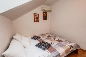 Postel nebo postele na pokoji v ubytování Maria Guest House