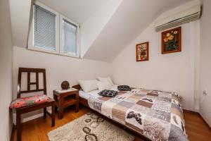 Postel nebo postele na pokoji v ubytování Maria Guest House