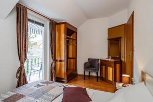 Postel nebo postele na pokoji v ubytování Maria Guest House