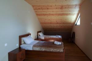 Letto o letti in una camera di Hotel Patriot
