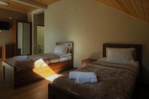 Postel nebo postele na pokoji v ubytování Hotel Patriot + 37 fotografií