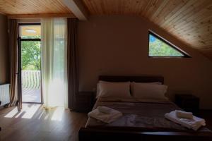 Letto o letti in una camera di Hotel Patriot