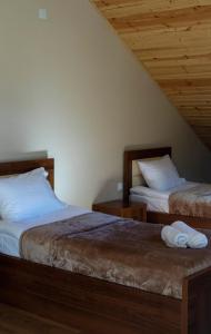 Letto o letti in una camera di Hotel Patriot