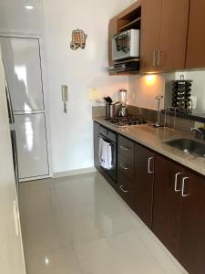 Kuchyň nebo kuchyňský kout v ubytování Apartamento Amoblado En Bucaramanga